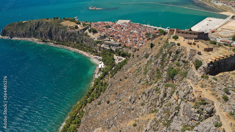 Aerial drone photo of medieval Venetian fortress of Palamidi built uphill in historic seaside town of Nafplio, Argolida, Peloponnese, Greece Aerial drone photo of medieval Venetian fortress of Palamidi built uphill in historic seaside town of Nafplio, Argolida, Peloponnese, Greece