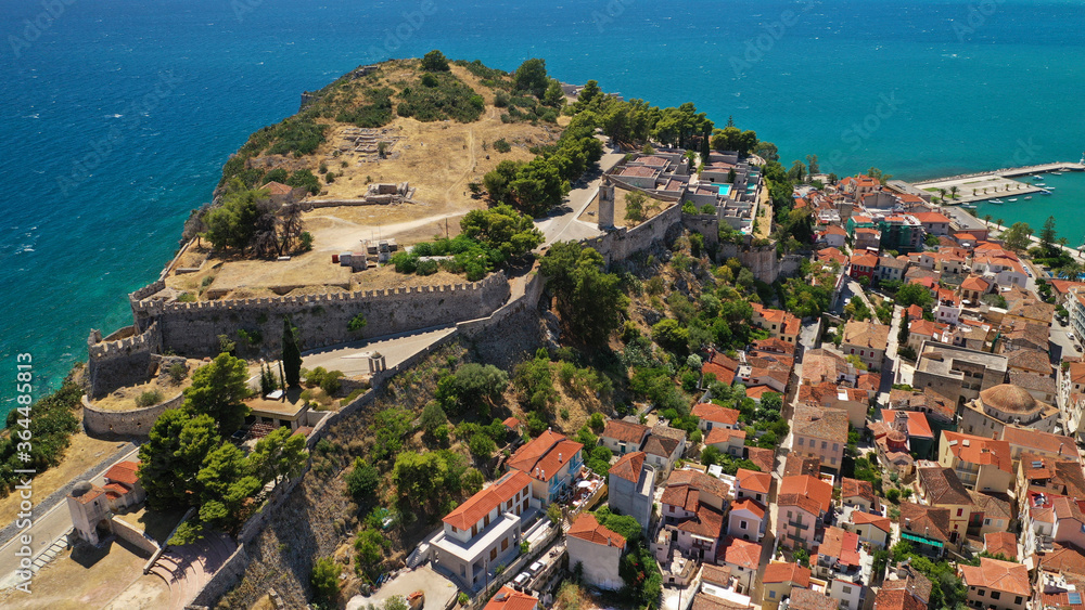 Aerial drone photo of picturesque and historic old town of Nafplio in the slopes of Palamidi fortress and Acronafplia, Argolida, Peloponnese, Greece
