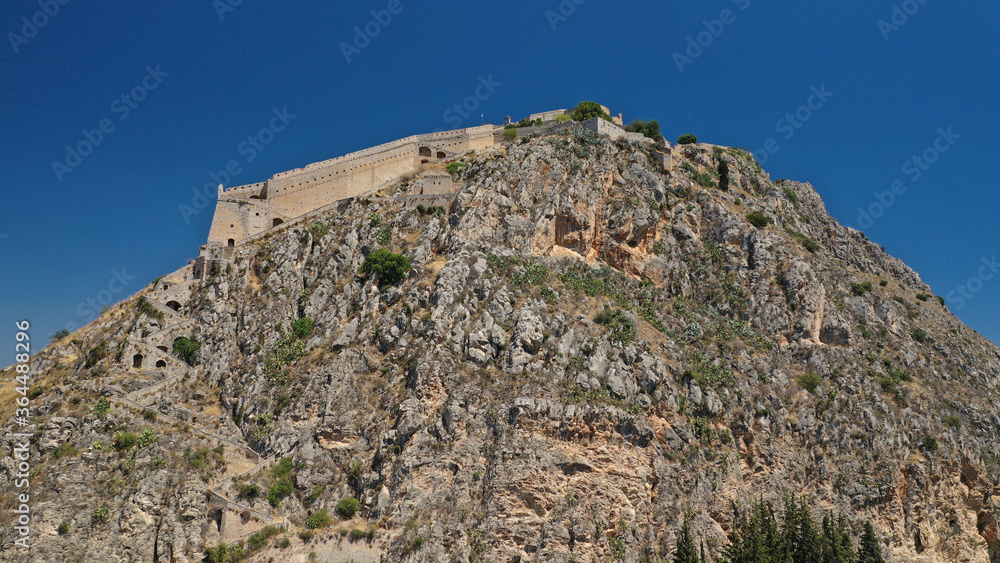 Aerial drone photo of picturesque and historic old town of Nafplio in the slopes of Palamidi fortress and Acronafplia, Argolida, Peloponnese, Greece Aerial drone photo of picturesque and historic old town of Nafplio in the slopes of Palamidi fortress and Acronafplia, Argolida, Peloponnese, Greece