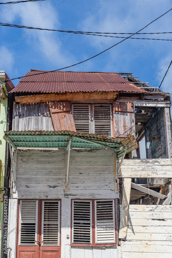 Old dilapidated wooden houses in Vauclin, Martinique, France