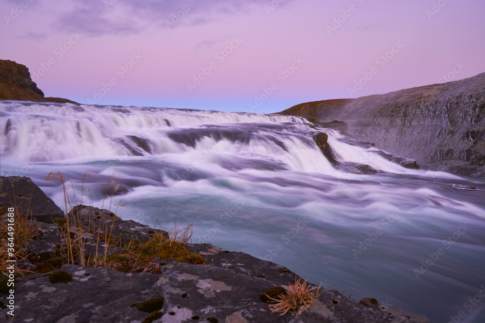 Fototapeta premium Gullfoss smooth water waterfall Iceland landscape travel outdoor beautiful sunset