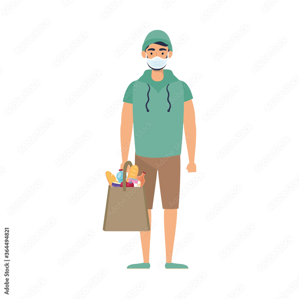 young man using medical mask with supermarket bag