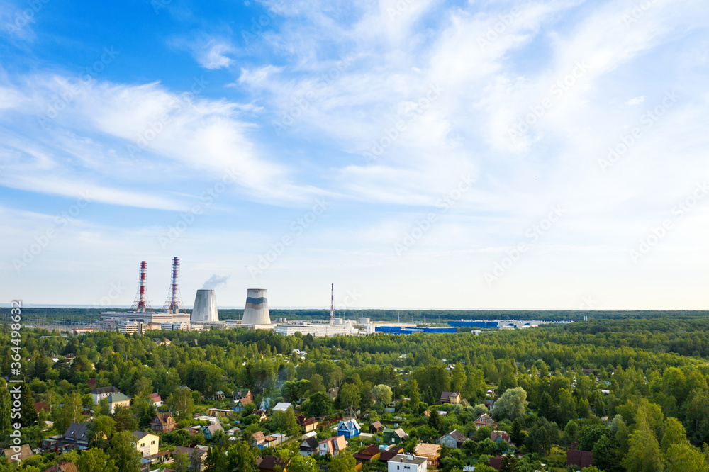 Obraz premium Smoking cooling pipes at power plant