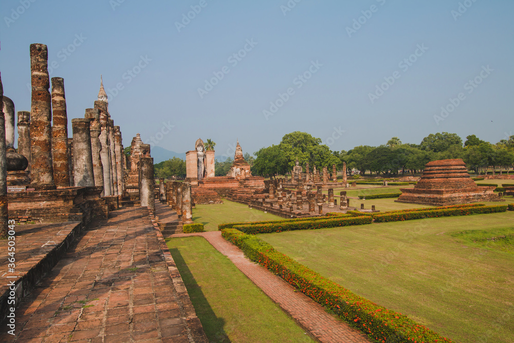 Ancient history Within the Sukhothai Historical Park In the orange sky in the evening Sukhothai, Thailand