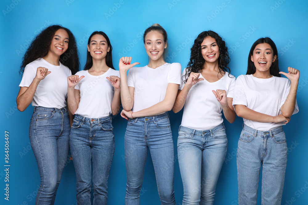 Diverse Girls Pointing At Themselves Smiling Posing In Studio Diverse Girls Pointing At Themselves Smiling Posing In Studio
