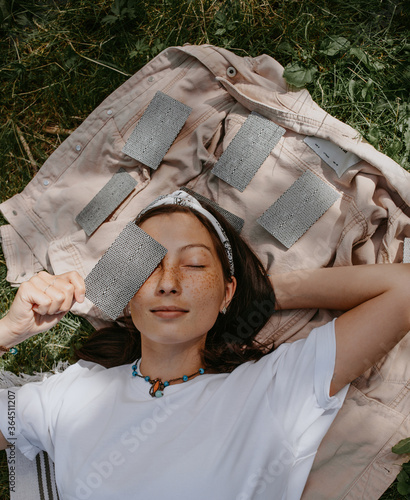 woman with tarot cards on a picnic