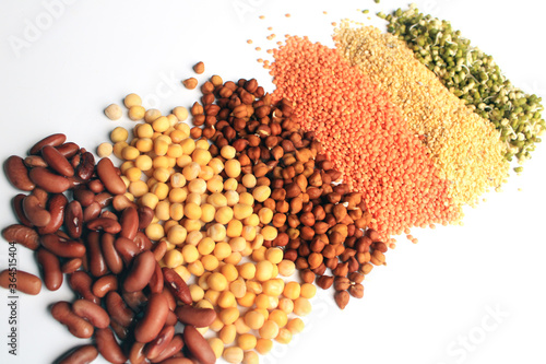 Collection of legumes (chickpeas, green peas, Pink lentils, green mung beans, Dry peas, Pigeon Peas, Red Kidney) isolated on white background.