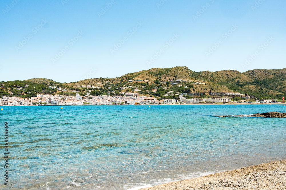 landscape view of costa brava coast and beach in catalonia region in spain with view over selva village, on a sunny summer day