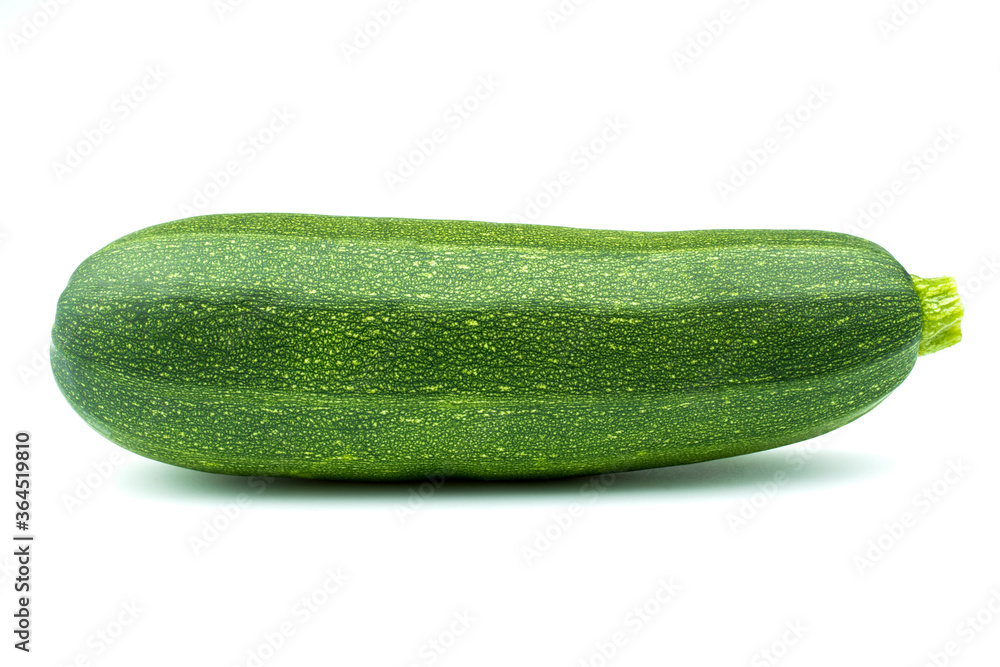 Zucchini green color close-up isolated on a white background. Zucchini green color close-up isolated on a white background.