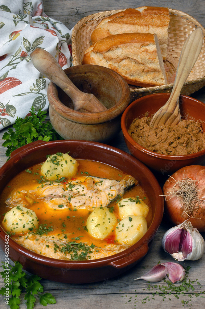 Cazuela de pescado y bol con gofio en Canarias foto de Stock | Adobe Stock
