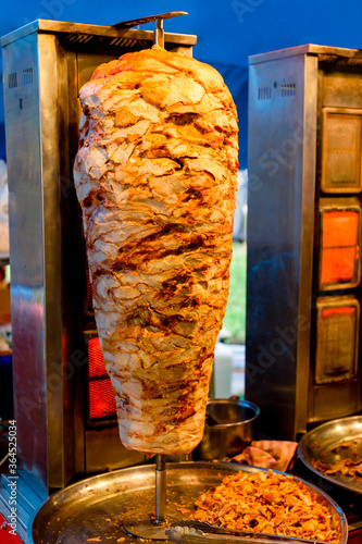 Vertical kebab near grill