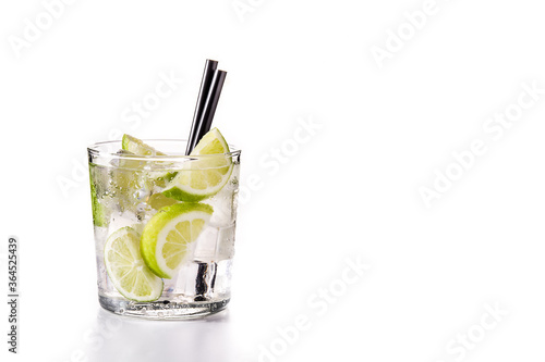 Caipiroska cocktail with lime isolated on white background. Copy space