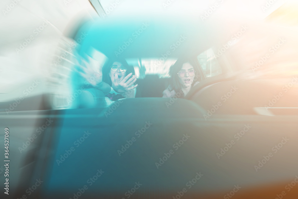 Fototapeta premium Car accident concept, two female friends in a car