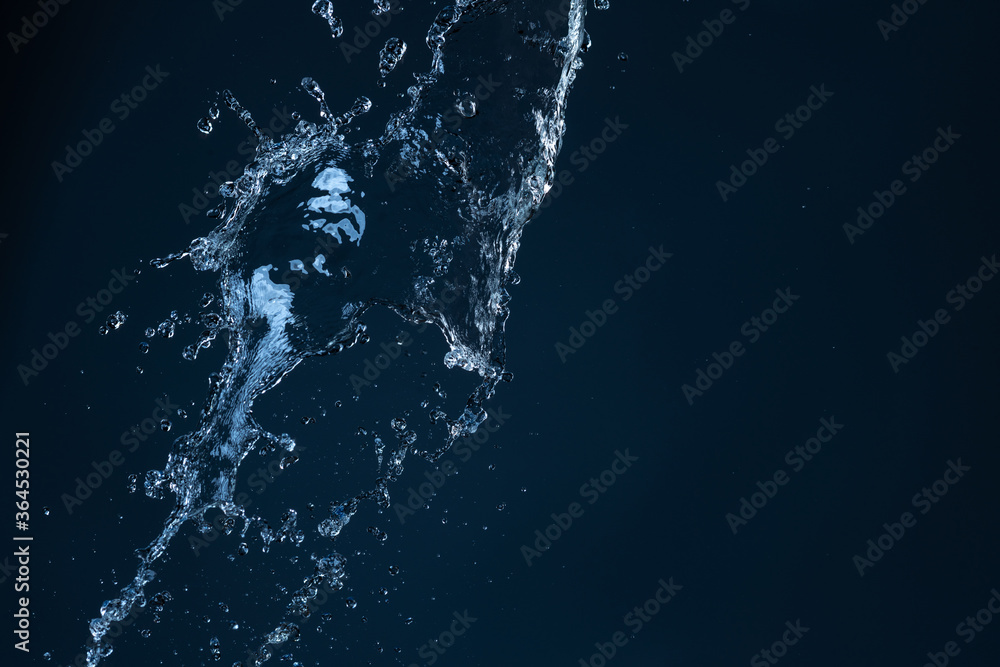 Water Splash With Motion Blur Effect Over Black Background