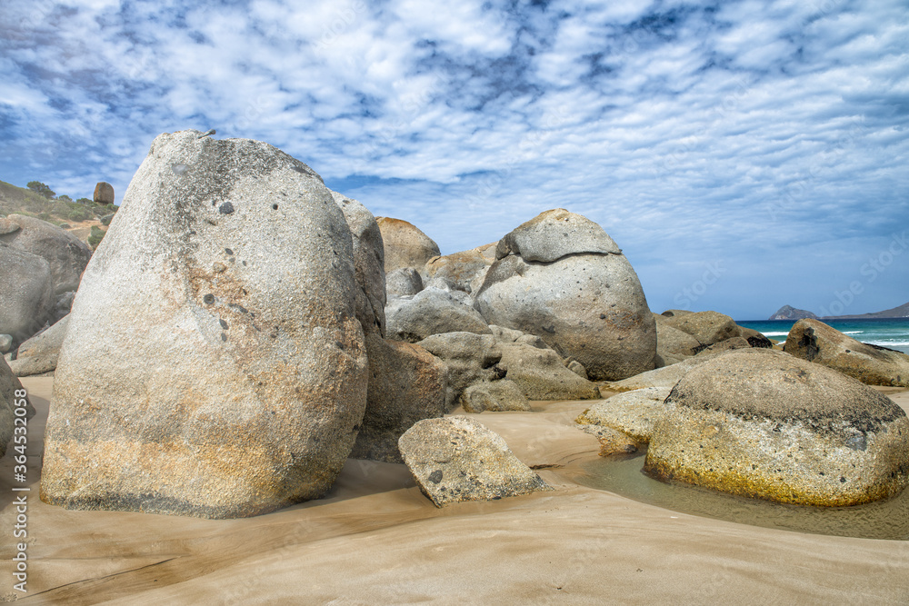 Huge orange bolders at Squeaky Beach in Wilsons Promontory, Victoria, Australia Huge orange bolders at Squeaky Beach in Wilsons Promontory, Victoria, Australia