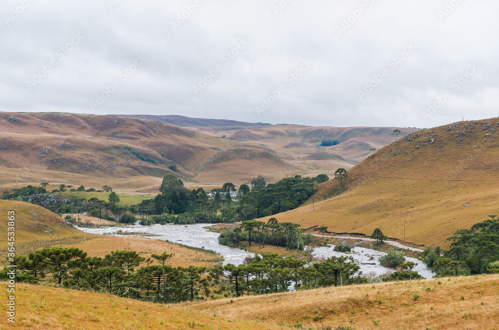 Naklejka premium Beautiful view of the Silveira River in the State of Rio Grande do Sul, Brazil, river for rainbow trout fishing.