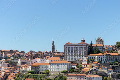 Colorful houses of Porto Ribeira, traditional facades, old multi-colored houses with red roof tiles on the embankment in the city of Porto, Portugal. Unesco World Heritage site.