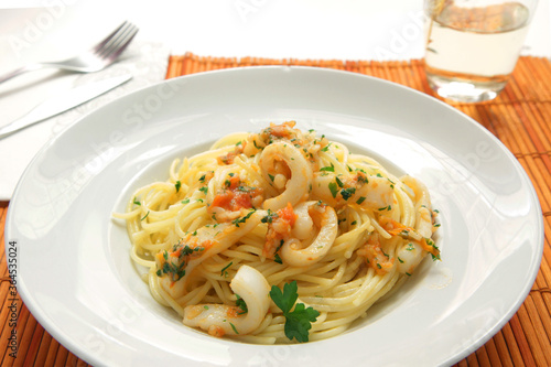 Spaghetti with calamari and vegetables
