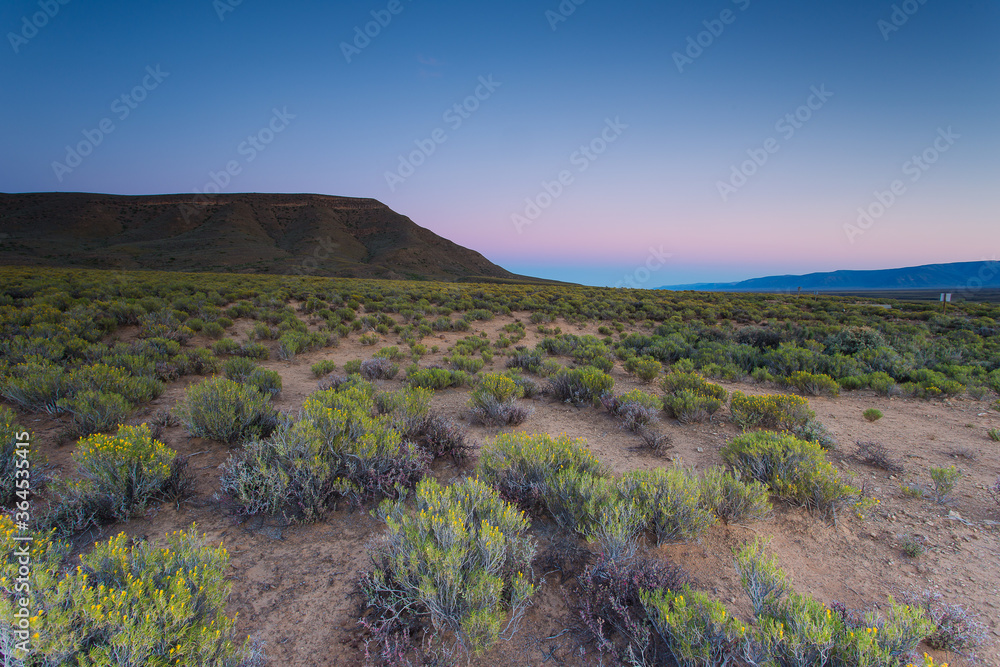 Wide Angle view of sunrise over the Tankwa Karoo close to Sutherland in the Northern Cape of South Africa