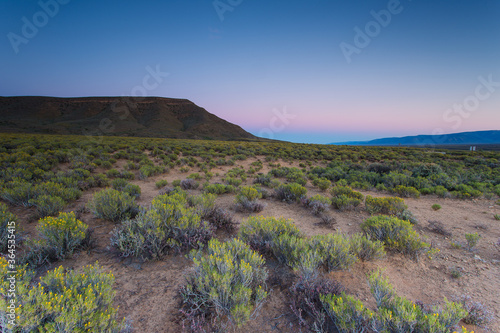 Wide Angle view of sunrise over the Tankwa Karoo close to Sutherland in the Northern Cape of South Africa © Dewald