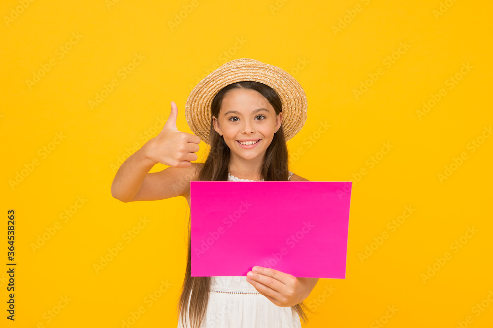 happy childhood. summer holiday and vacation. kid seasonal fashion sales. carefree beauty show paper sheet. copy space. kid in straw hat with thumb up. little child advertises beach activity happy childhood. summer holiday and vacation. kid seasonal fashion sales. carefree beauty show paper sheet. copy space. kid in straw hat with thumb up. little child advertises beach activity