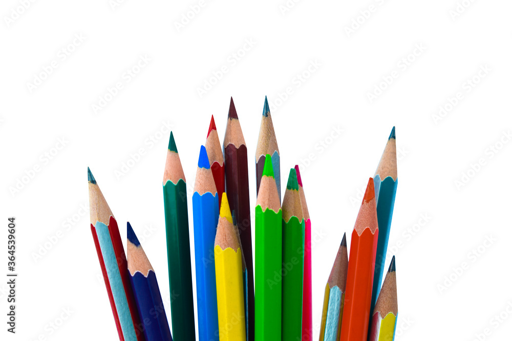 One huge pile of different colored wood pencil crayon placed on a white background One huge pile of different colored wood pencil crayon placed on a white background