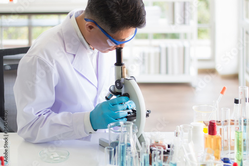 Epidemiological scientists are using microscopes to look at the shape of the covid-19 bacteria to analyze and find ways to prevent and destroy pathogens, as well as produce drugs and vaccines against.