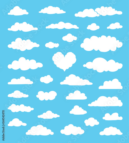 Fototapeta Naklejka Na Ścianę i Meble -  Set of various white cartoon clouds on blue background. vector illustration
