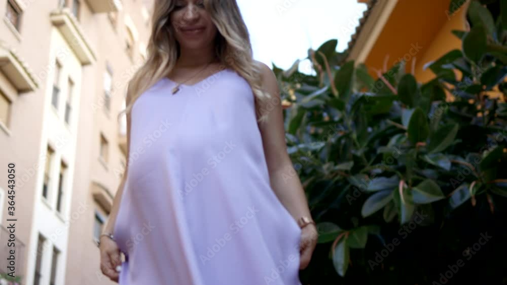 Young pregnant girl In marine ,purple dress , close up shot , ProRes HQ , Grade Young pregnant girl In marine ,purple dress , close up shot , ProRes HQ , Grade