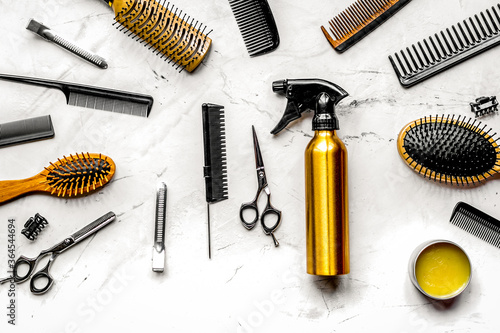 hairdressing concept with barber tools on white background top view