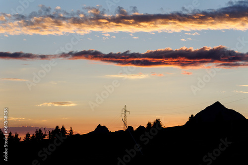 High voltage tower and sky sunset background