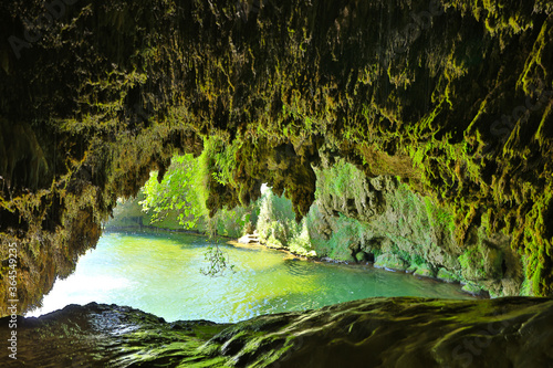 beautiful cave and green lake