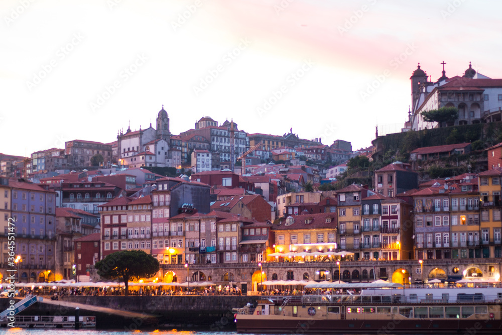 Porto or Oporto is the second-largest city in Portugal and one of the Iberian Peninsula's major urban areas. Porto is famous for Houses of Ribeira Square located in the historical center of Porto, P Porto or Oporto is the second-largest city in Portugal and one of the Iberian Peninsula's major urban areas. Porto is famous for Houses of Ribeira Square located in the historical center of Porto, P