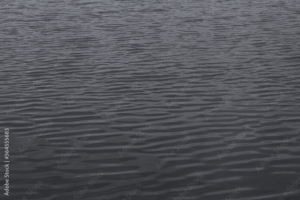 Water surface blurred texture. Abstract gray background. Imitation steel Water surface blurred texture. Abstract gray background. Imitation steel