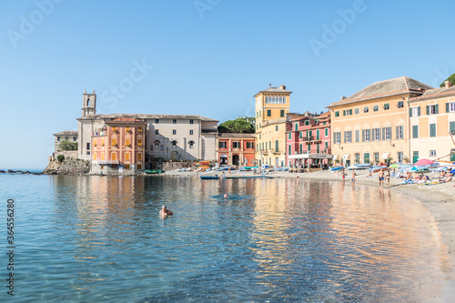 The beach of Silence in Sestri Levante with many colored houses © Alessio