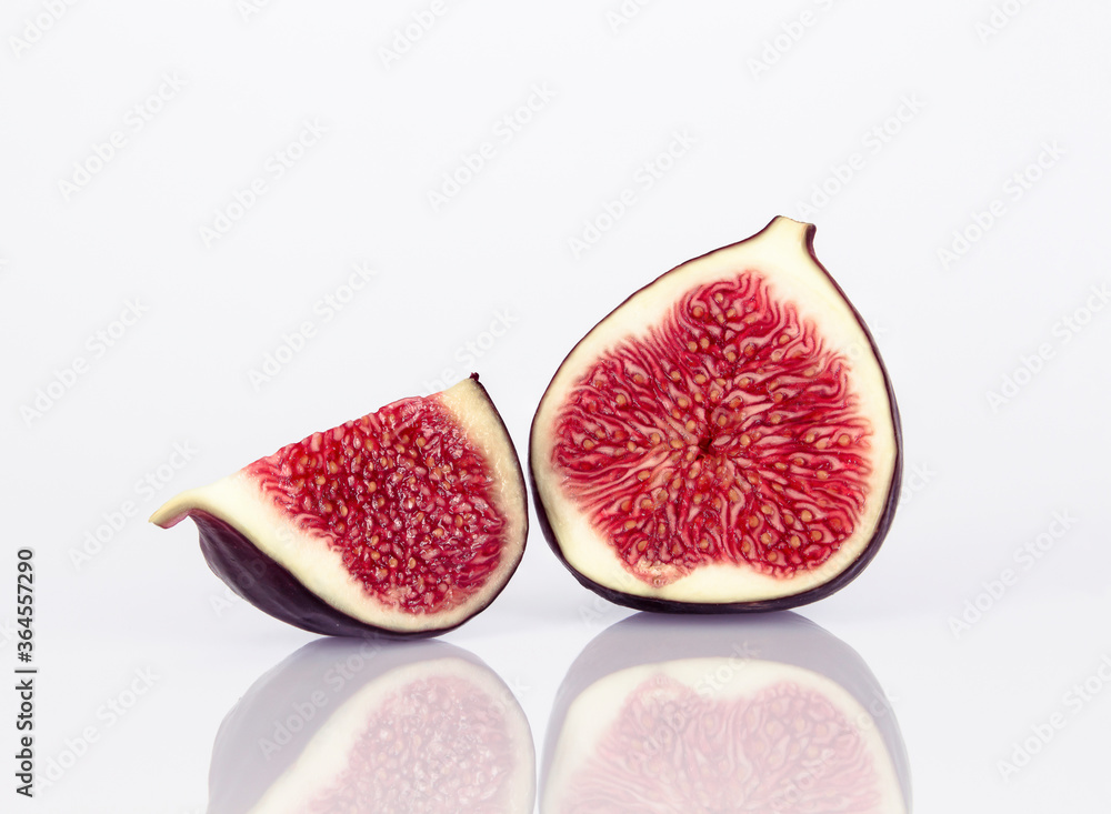 Sliced fresh figs on white background Sliced fresh figs on white background
