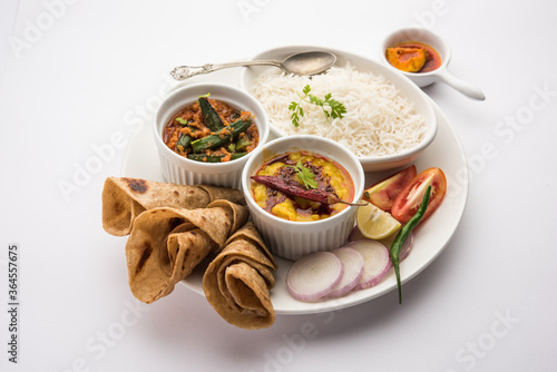 Indian Food Platter or Thali contains vegetarian recipes, a complete meal photo