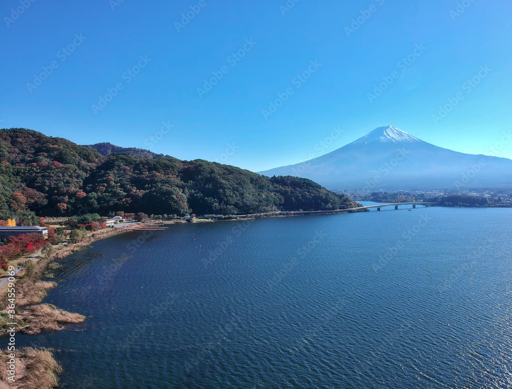 A beautiful day at Lake Kawaguchi with a clear sky showing the impressive Mount Fuji in the background