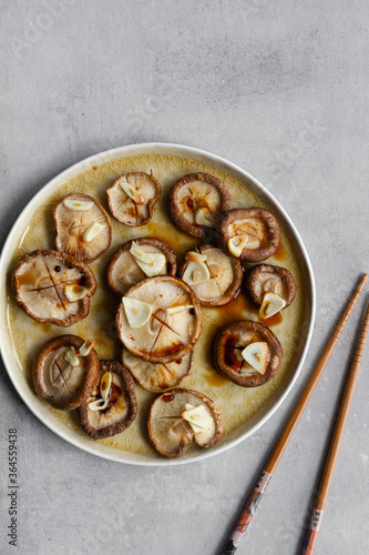 Delicious baked mushrooms with garlic poured with soy sauce