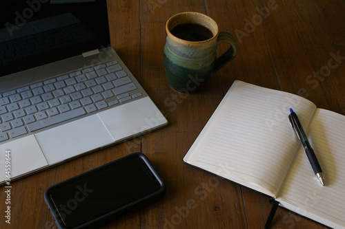 notebook and pen on desk