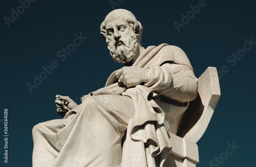 Statue of the ancient Greek philosopher Plato in Athens, Greece. photo