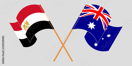 Crossed and waving flags of Egypt and Australia