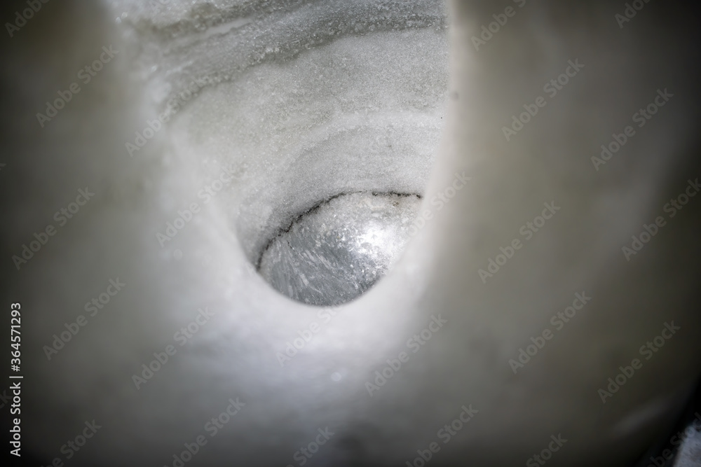 Fototapeta premium Ice wall with hole, ice cave in Iceland