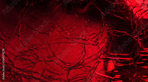 Cracked red glass texture, background