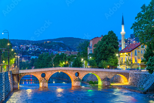 Skyline of Sarajevo at the twilight with arched Latin Bridge, Sarajevo, Bosnia and Herzegovina photo