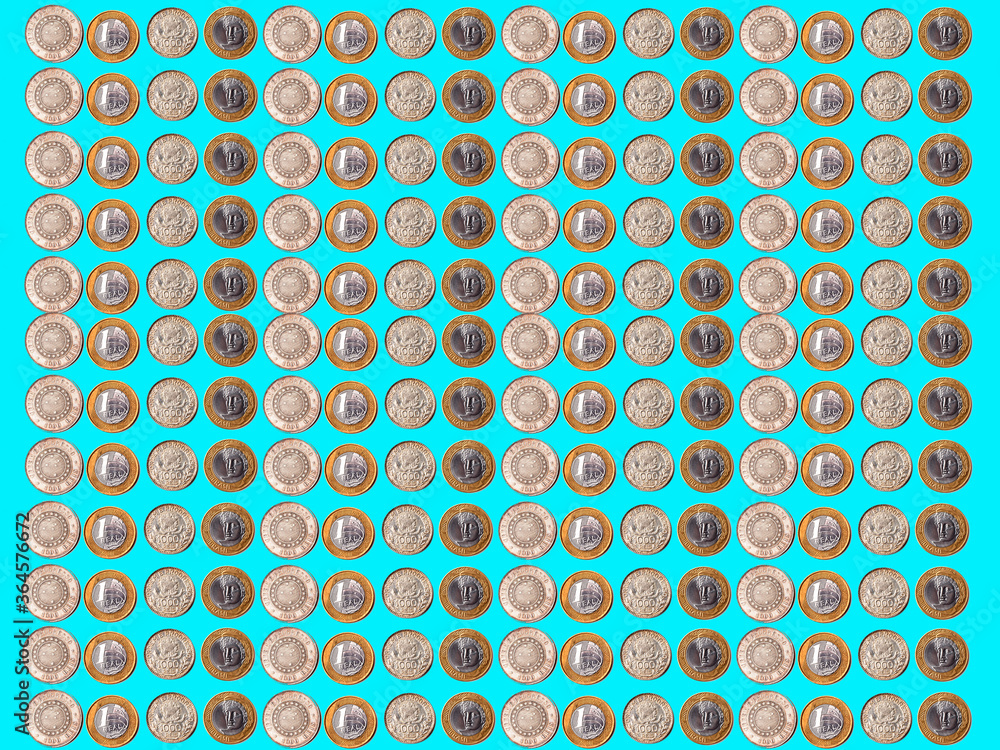 Old and new Brazilian coins pattern. Coins over light colored background. Old and new Brazilian coins pattern. Coins over light colored background.
