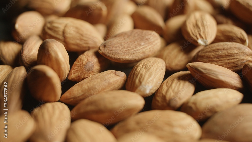 Macro slide shot of Pile of Almonds Macro slide shot of Pile of Almonds