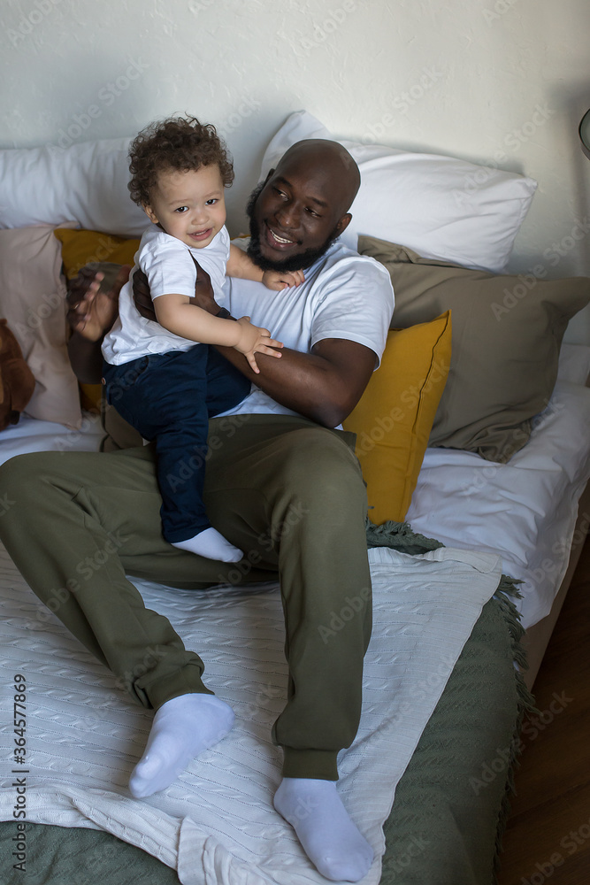 Dad and son playing, African Americans Dad and son playing, African Americans