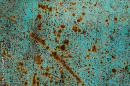 texture of blue metal with rust spots of different sizes on it