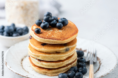 Stack of blueberry pancakes. Homemade corn pancakes with blueberries